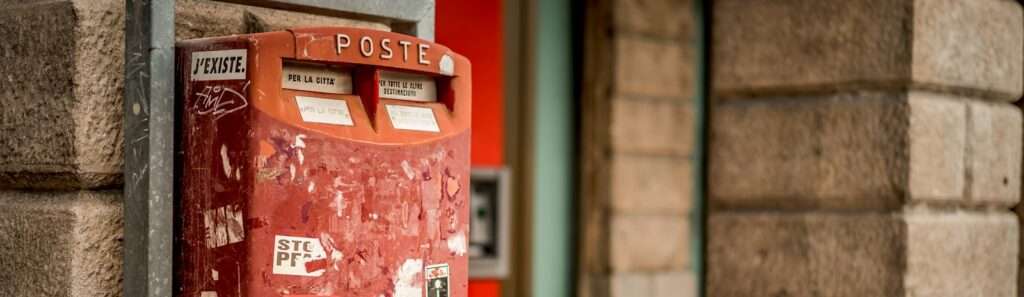 tilt shift lens photography of red steel case