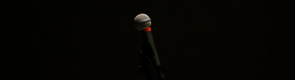 black corded microphone with stand