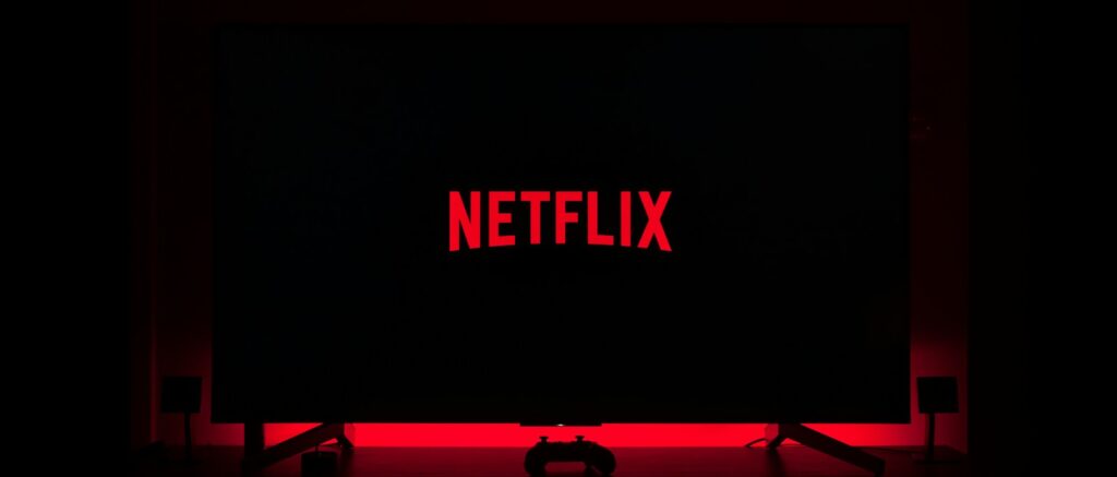 flat screen television displaying Netflix logo