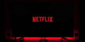 flat screen television displaying Netflix logo