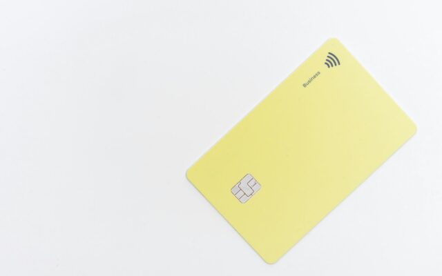 yellow square card on white surface